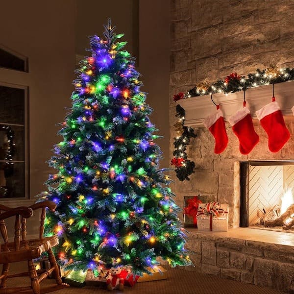 putting lights on a Christmas tree