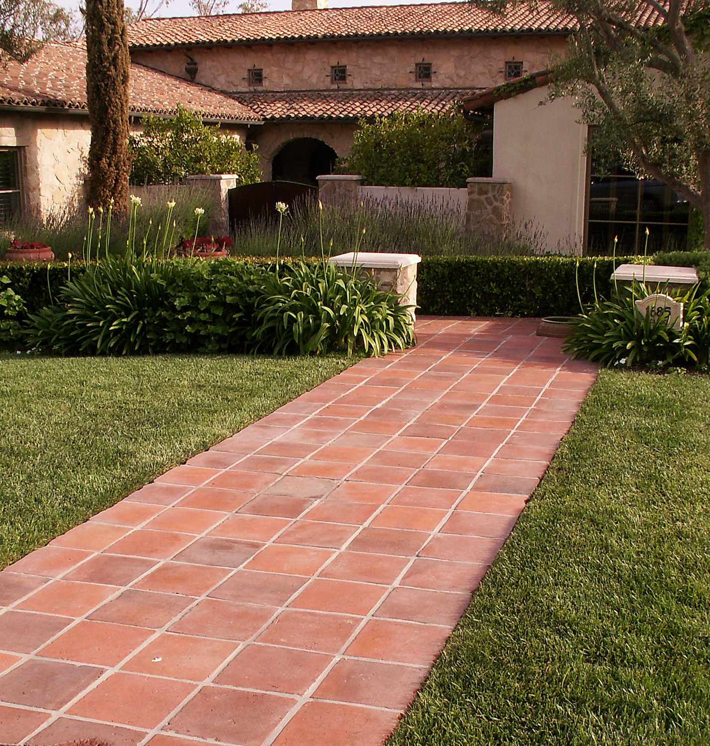 Terracotta Tiles Path Leading to House