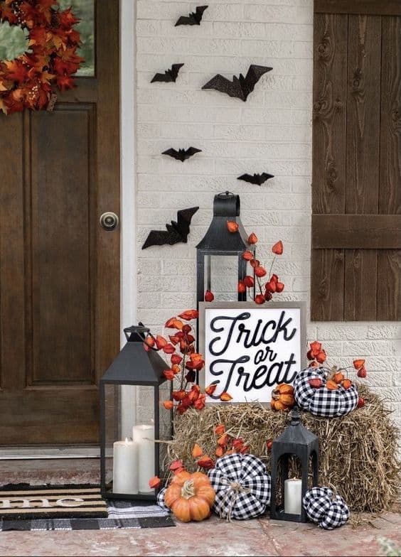 Black-and-White Halloween Porch with Lanterns and Pumpkins