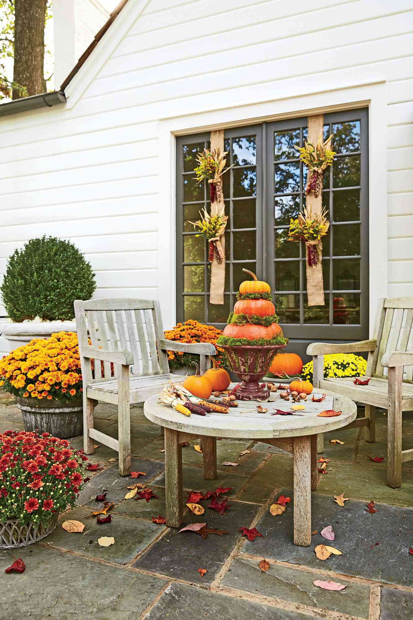 Outdoor Fall Table with Pumpkin Centerpiece and Harvest Decor