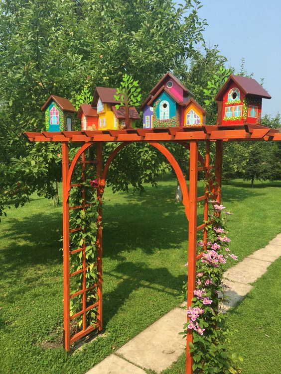 Vibrant Birdhouse Arbor Gateway