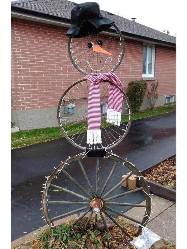 Whimsical Wheel Snowman Creation