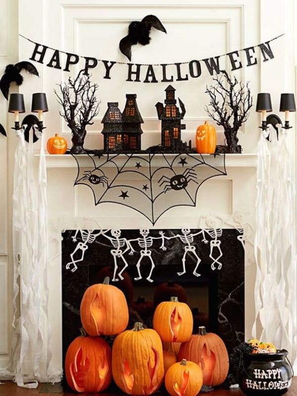 Festive Pumpkin and Skeleton Halloween Mantle