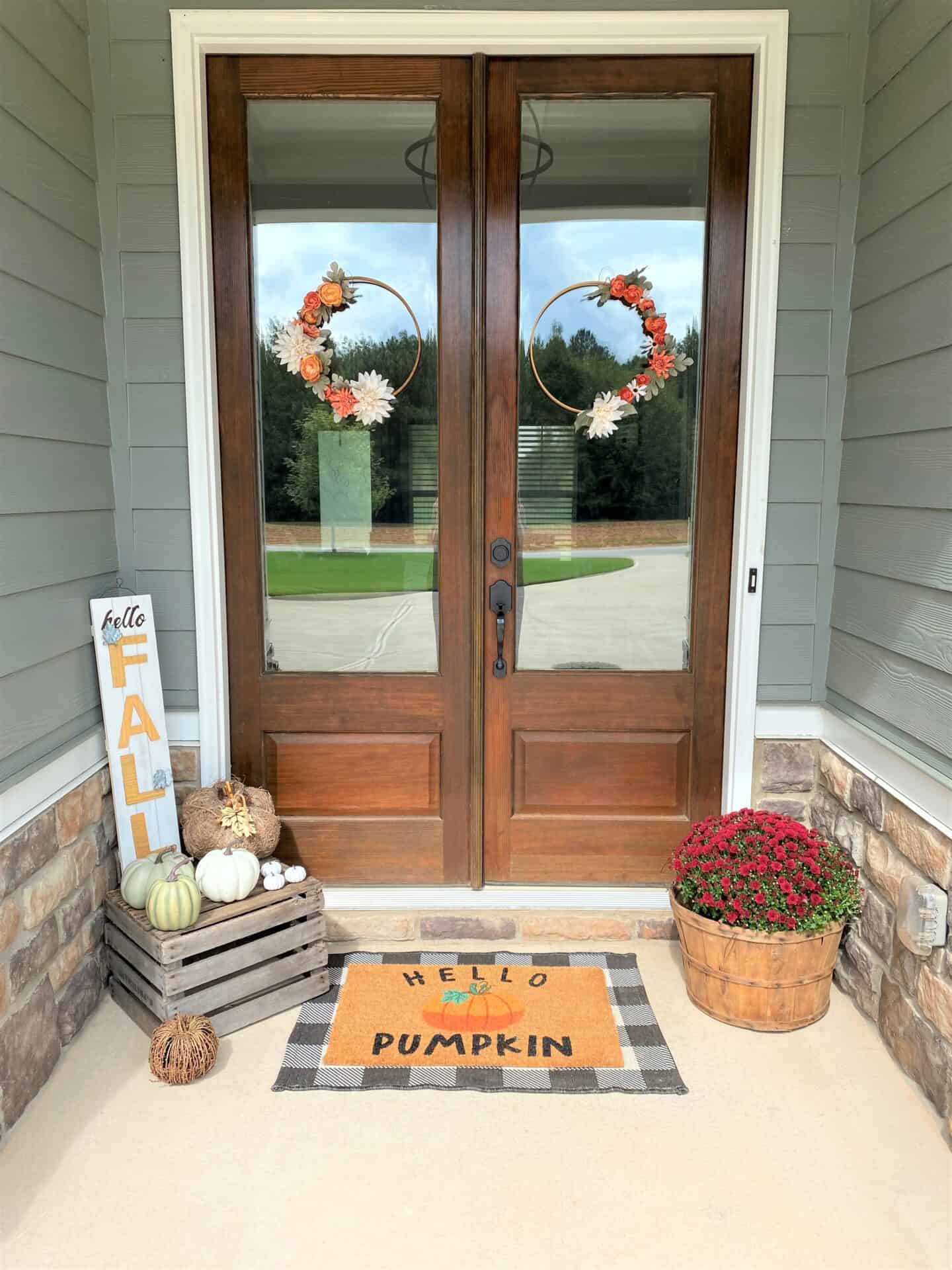 Fall Porch with Minimalist Pumpkin and Floral Decor