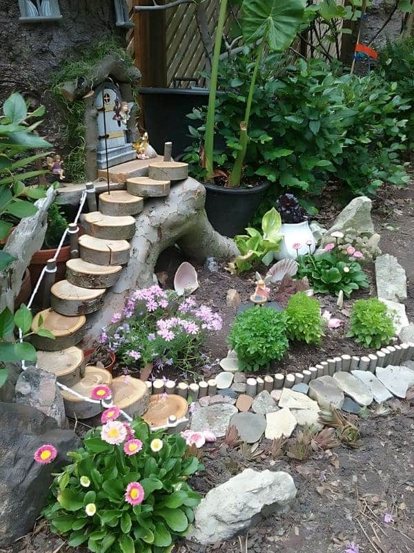 Gnome Garden with Wooden Stairway and Floral Delight