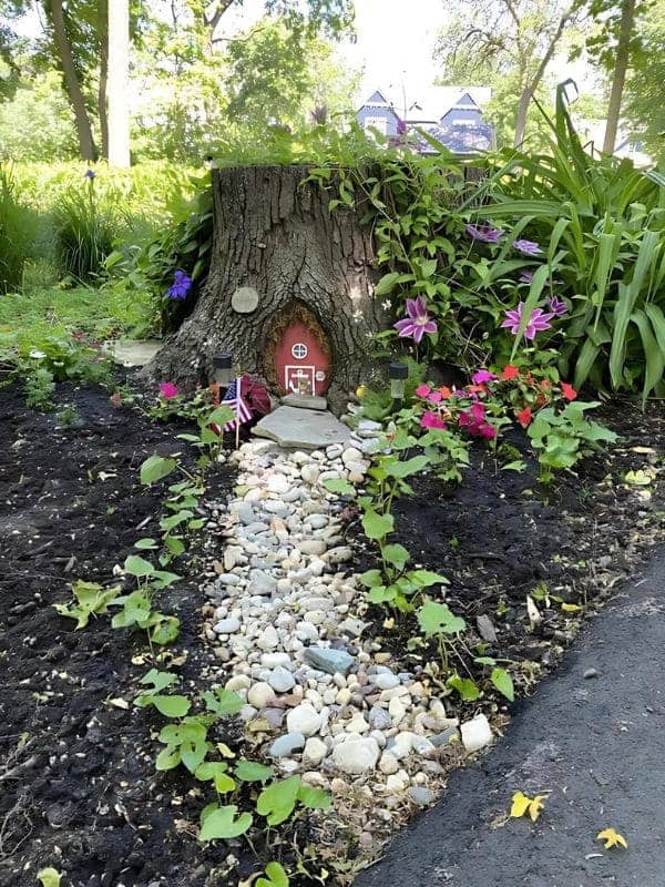 Tree Stump Gnome Retreat with Colorful Pathway Magic