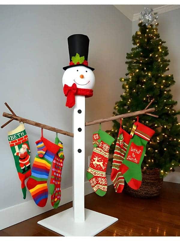 Festive Snowman Branch Stocking Stand