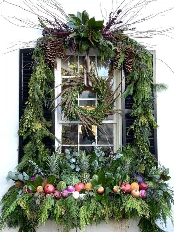 Lush Greenery and Fruit Christmas Window Display