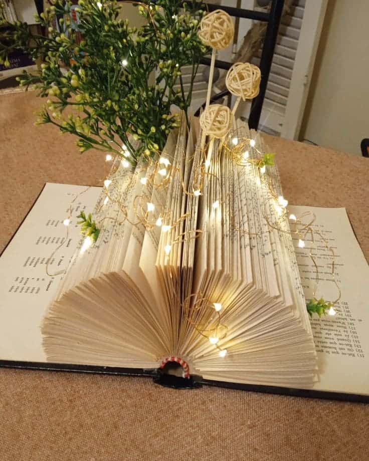 Glowing Book Centerpiece Elegance