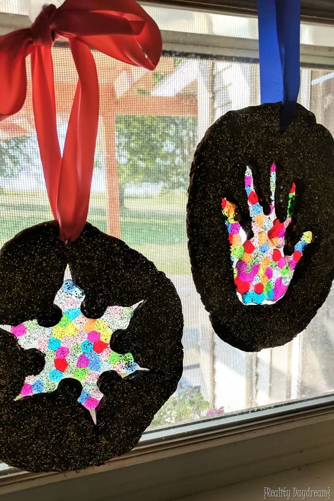 Glowing Handprint and Snowflake Glitter Suncatchers