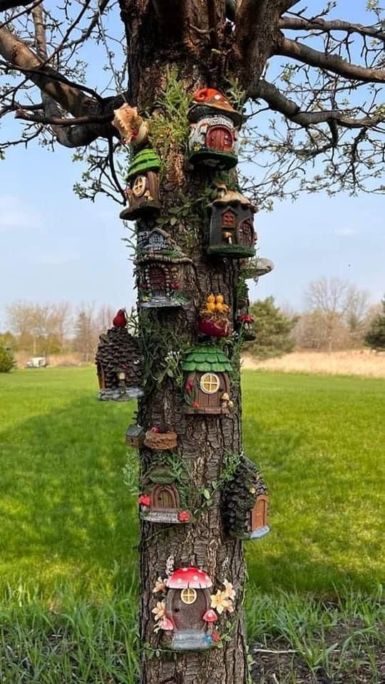 20 Whimsical Tree Trunk Projects That Transform Your Outdoor Space DIY Enchanted Fairy Village Tree