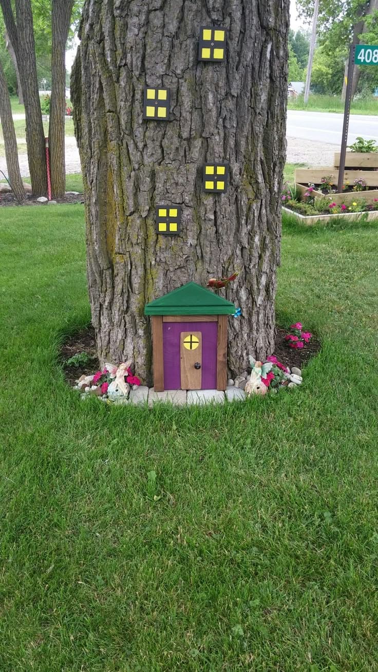 20 Whimsical Tree Trunk Projects That Transform Your Outdoor Space DIY Fairy Tree House with Windows