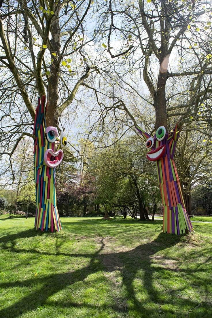 20 Whimsical Tree Trunk Projects That Transform Your Outdoor Space Giant Goofy Tree Faces