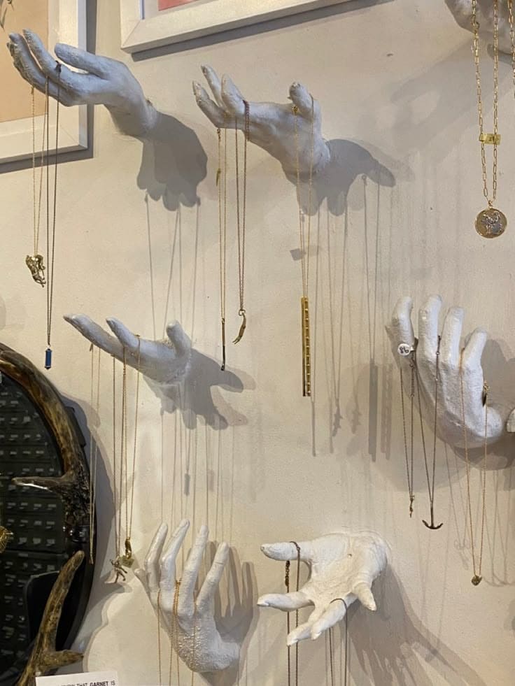 Wall-Mounted Plaster Hands Jewelry Display