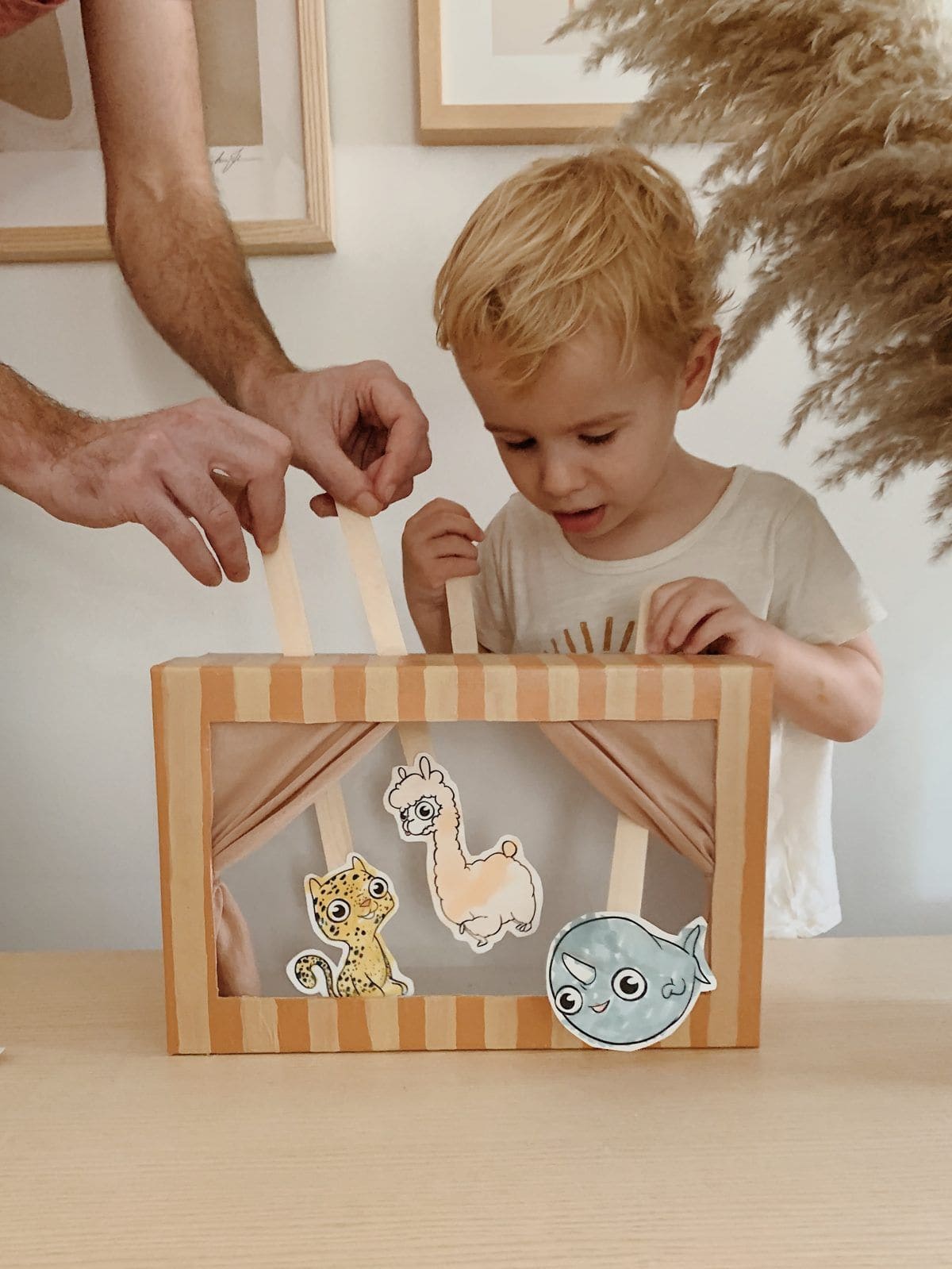 Striped Animal Puppet Theater with Playful Characters