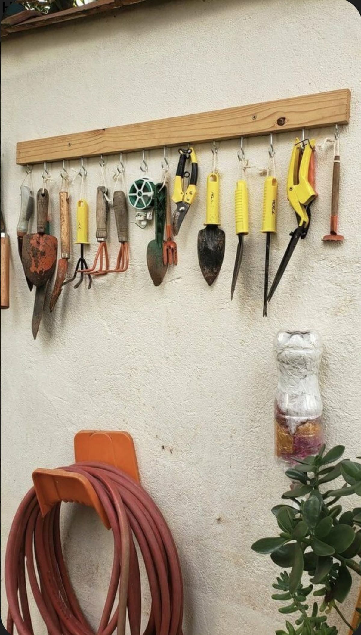 Wall-Mounted Hook Strip for Garden Tools