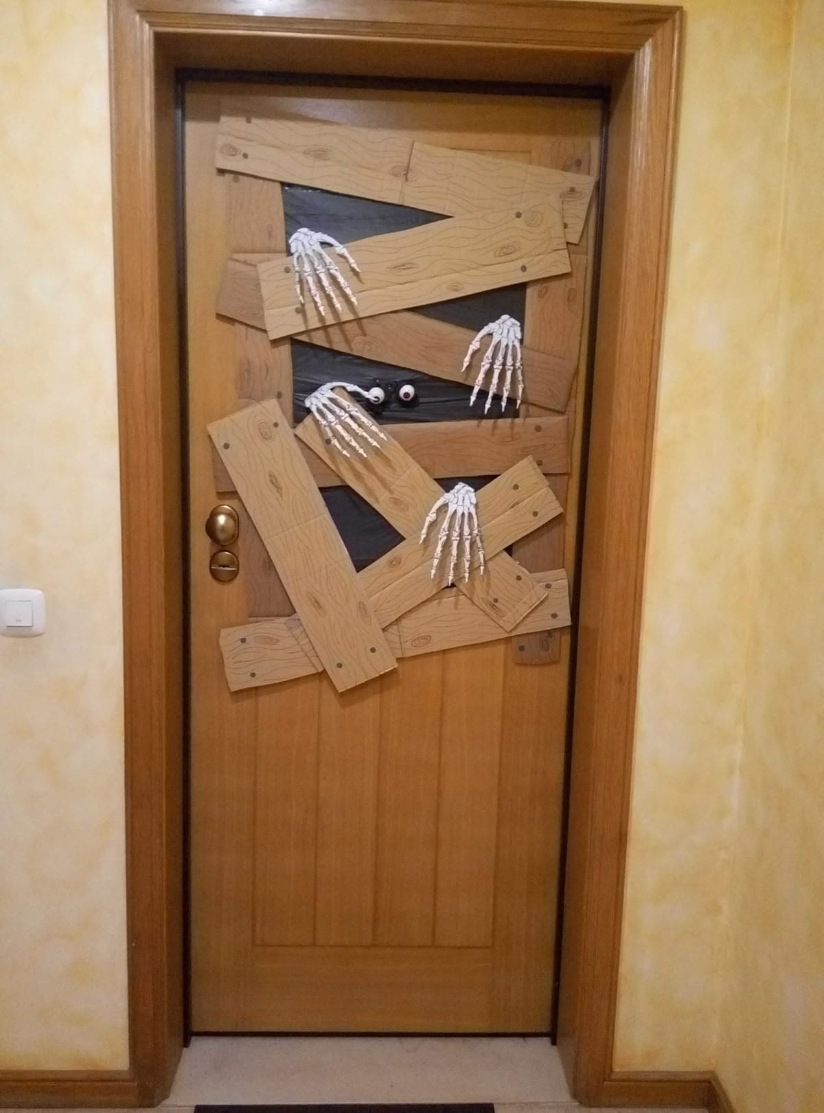 Boarded-Up Skeleton Hands Door