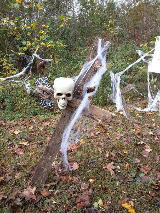 Cobweb-Covered Skull Cross