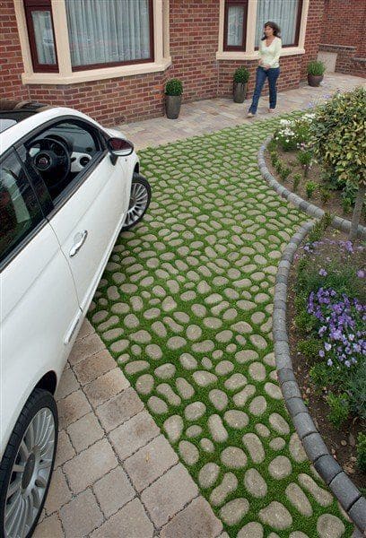 Green Cobblestone Driveway with Grass