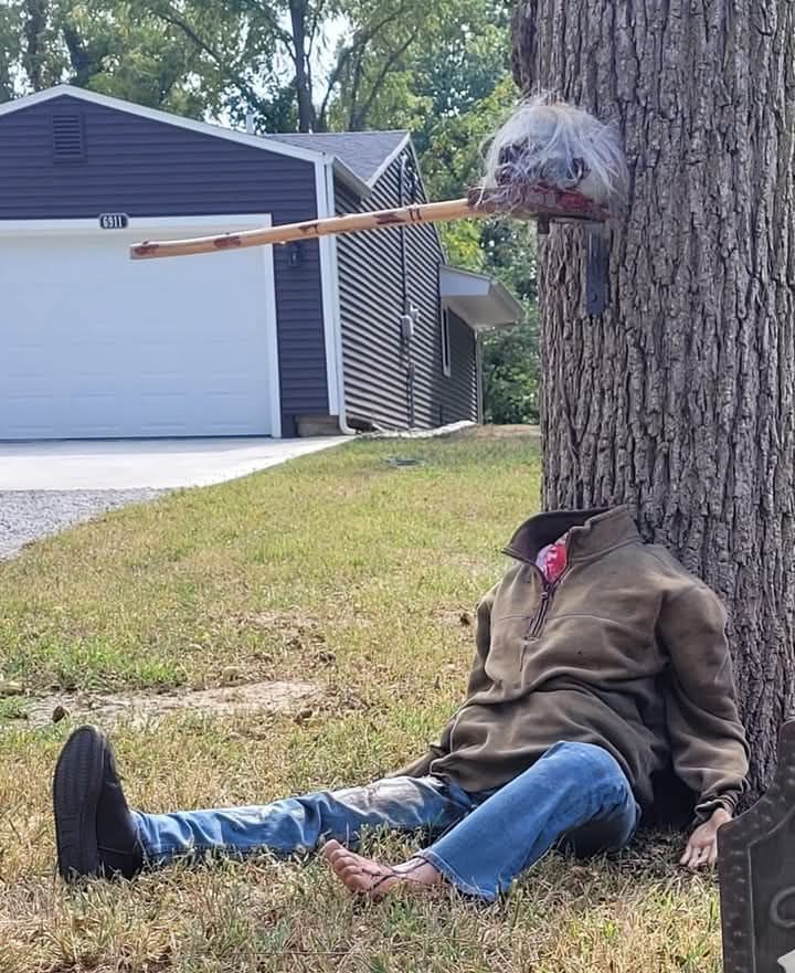 Headless Horror Tree Trap Driveway Scene