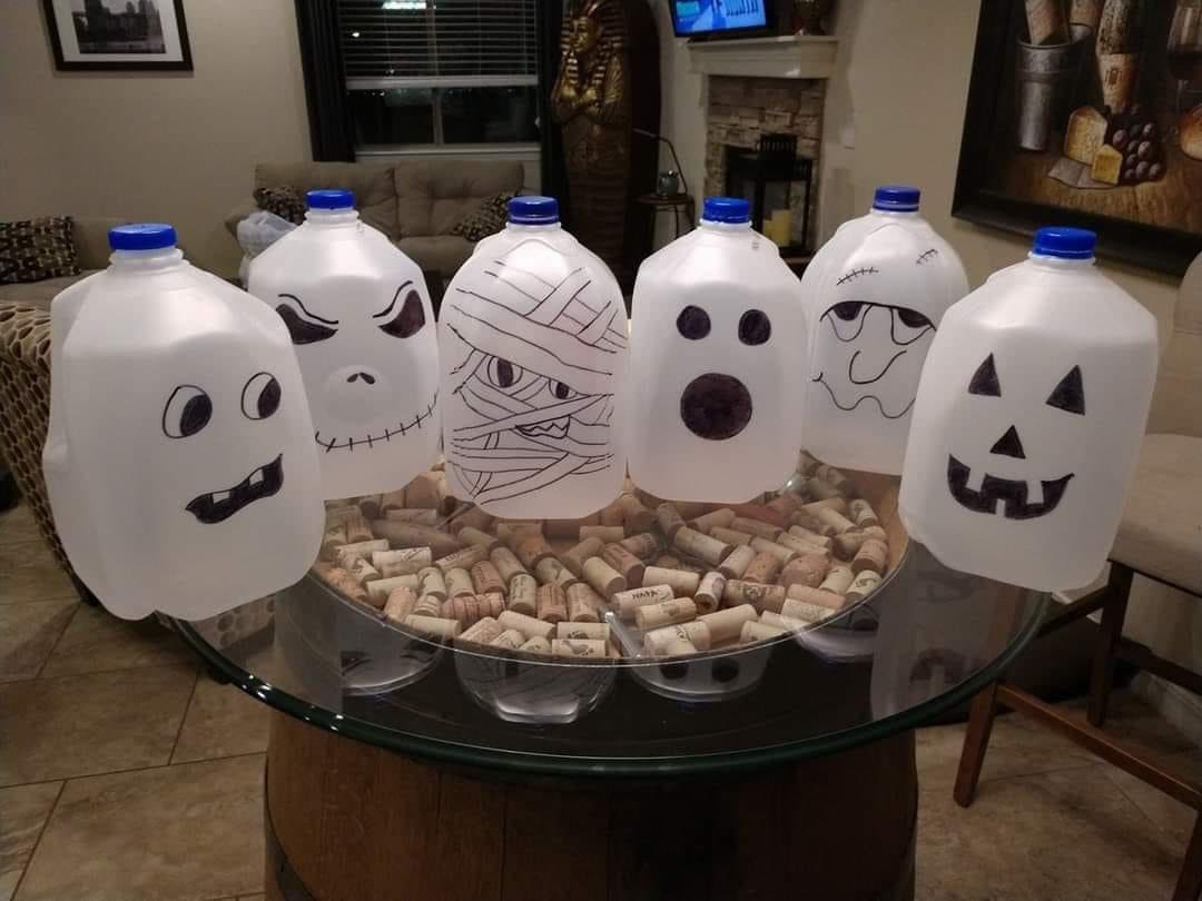 Spooky-Faced Milk Jug Lineup