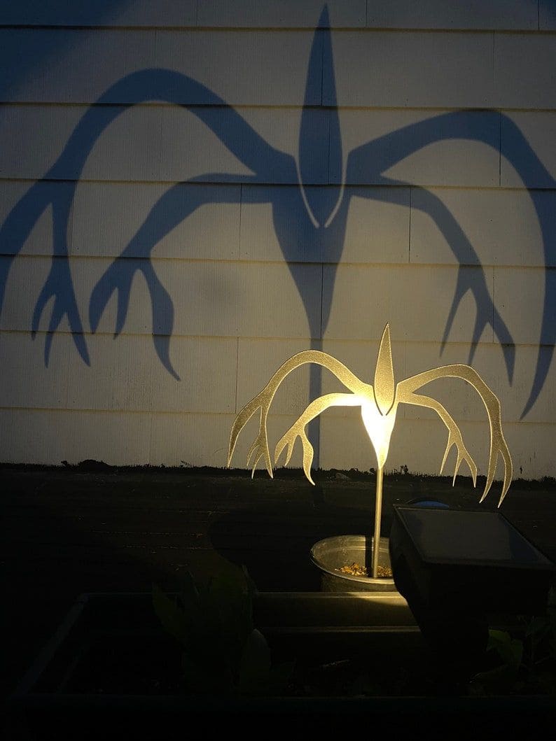 Tall Shadow Creature with Clawed Hands Halloween Silhouette