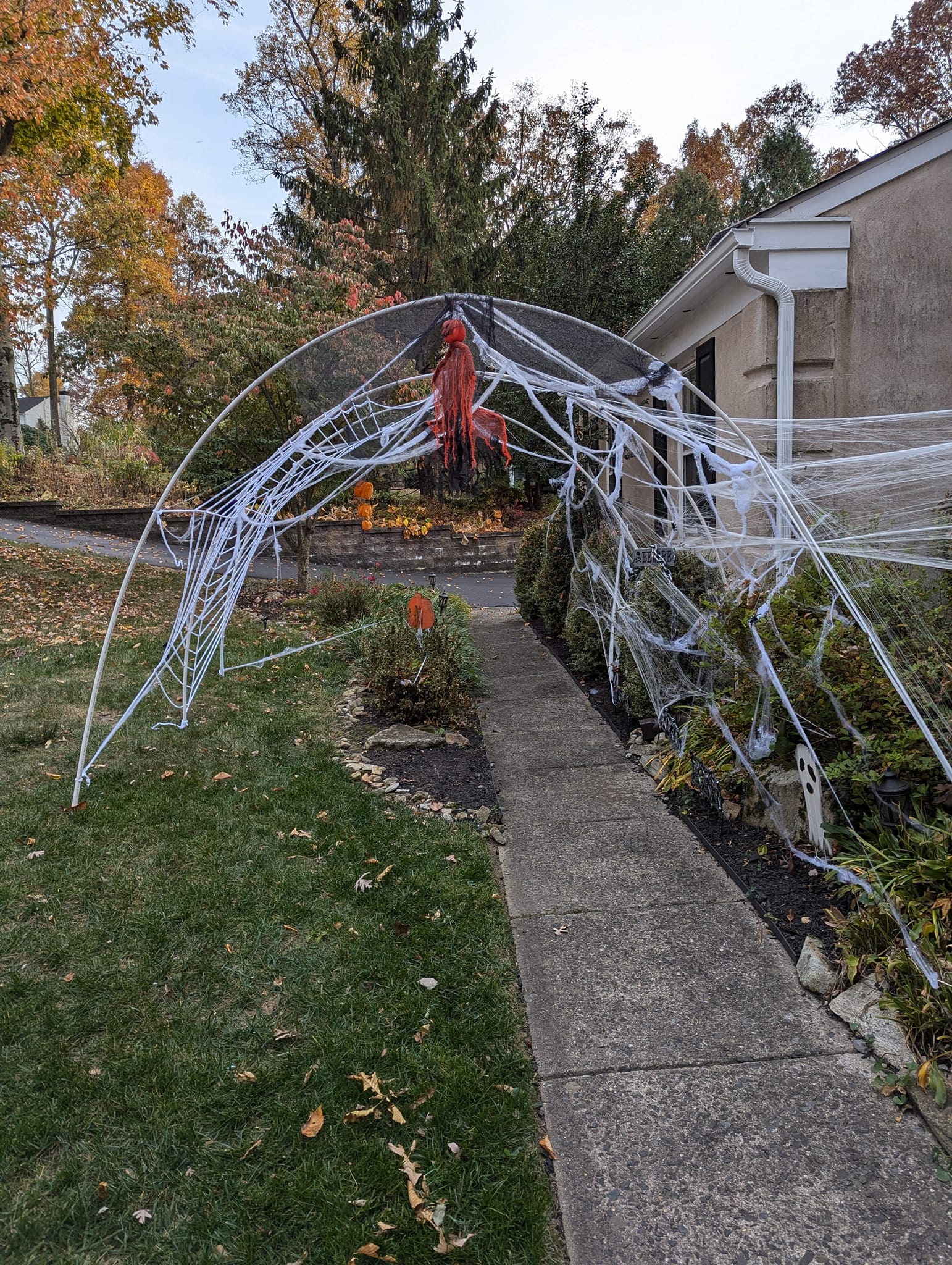 Webbed Walkway with Dangling Ghoul