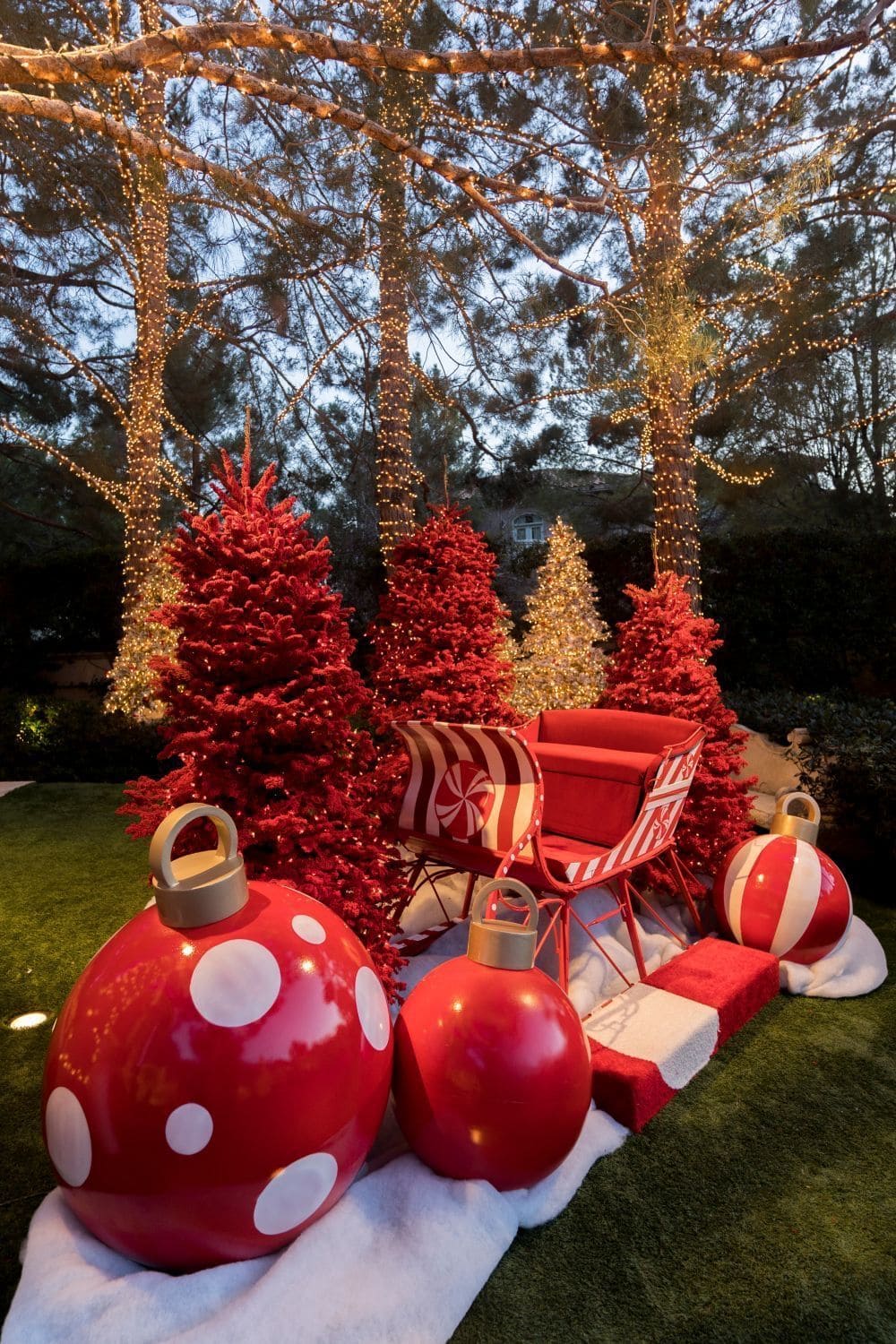 Oversized Ornaments and Candy Sleigh Display