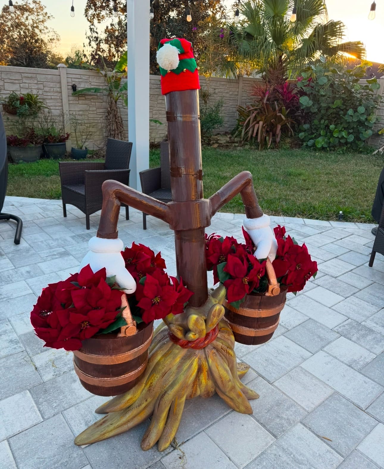 Whimsical Holiday Yard Decor with Poinsettia Buckets