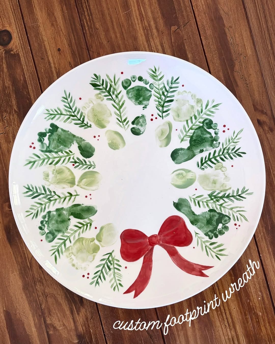 20 Fun Christmas Footprint Crafts to Make with Little Feet Baby Footprint Christmas Wreath Plate