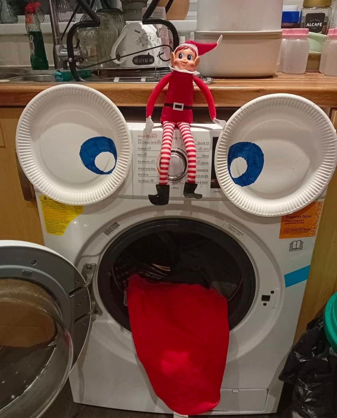 25 Hilarious Elf on the Shelf Ideas Crack Up the Whole Family Big-Eyed Laundry Surprise