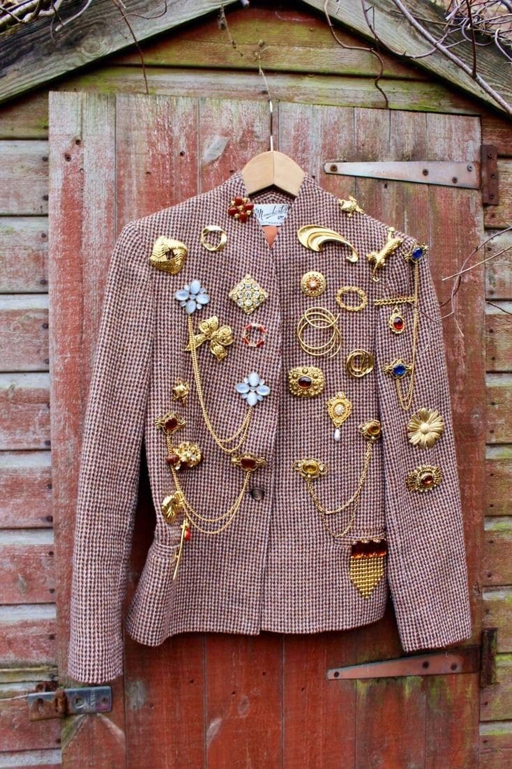 Brooch-Adorned Vintage Blazer Display