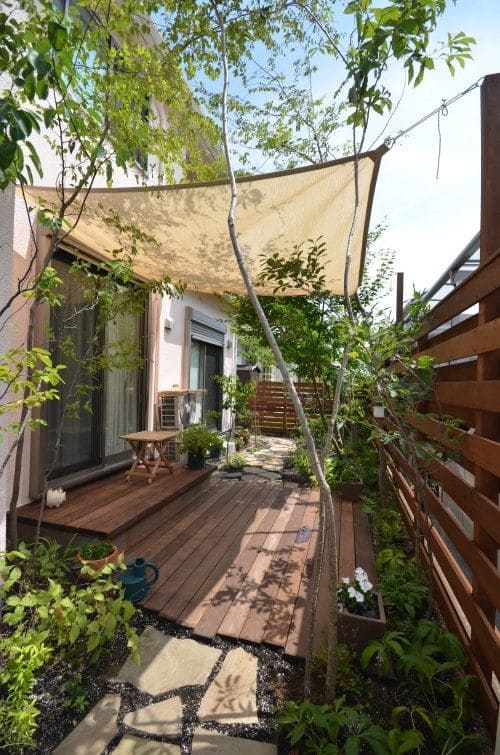 Cozy Deck With Sail Shade