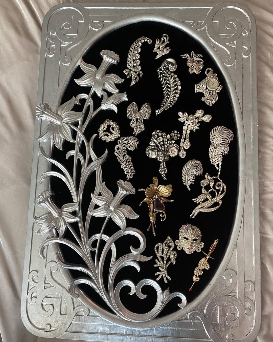 Elegant Silver Frame Brooch Display