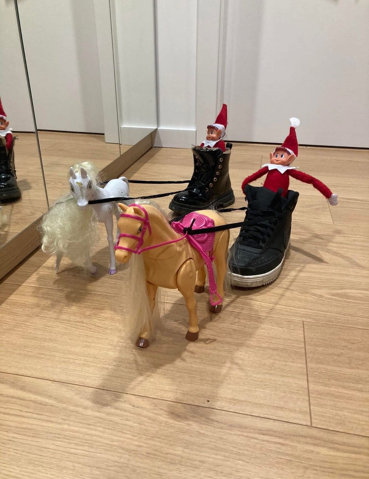 25 Hilarious Elf on the Shelf Ideas Crack Up the Whole Family Elf Shoe Sleigh Ride