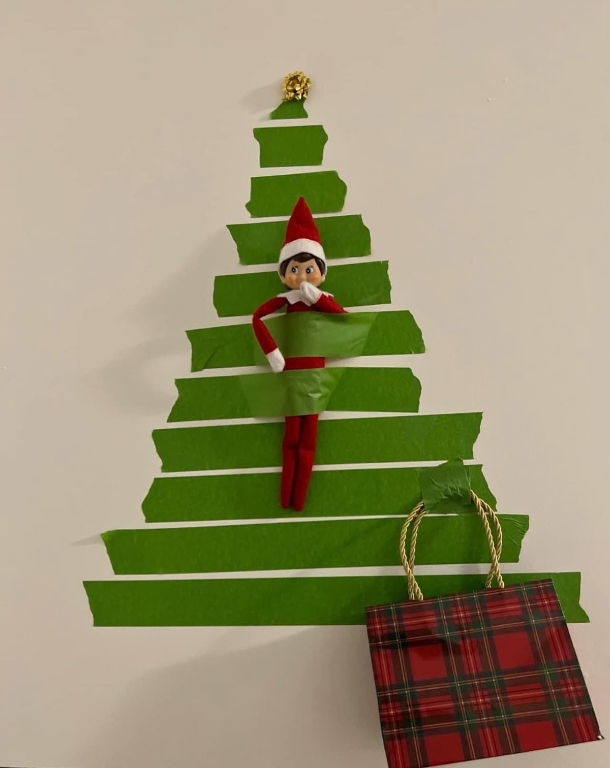 25 Hilarious Elf on the Shelf Ideas Crack Up the Whole Family Elf Stuck in Christmas Tree