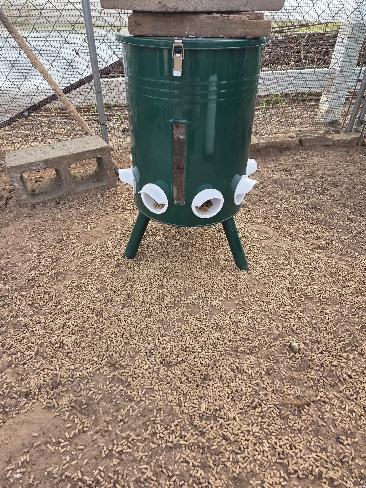 20 Budget-Friendly DIY Chicken Feeders That Reduce Waste Gravity Barrel Chicken Feeder with PVC Ports