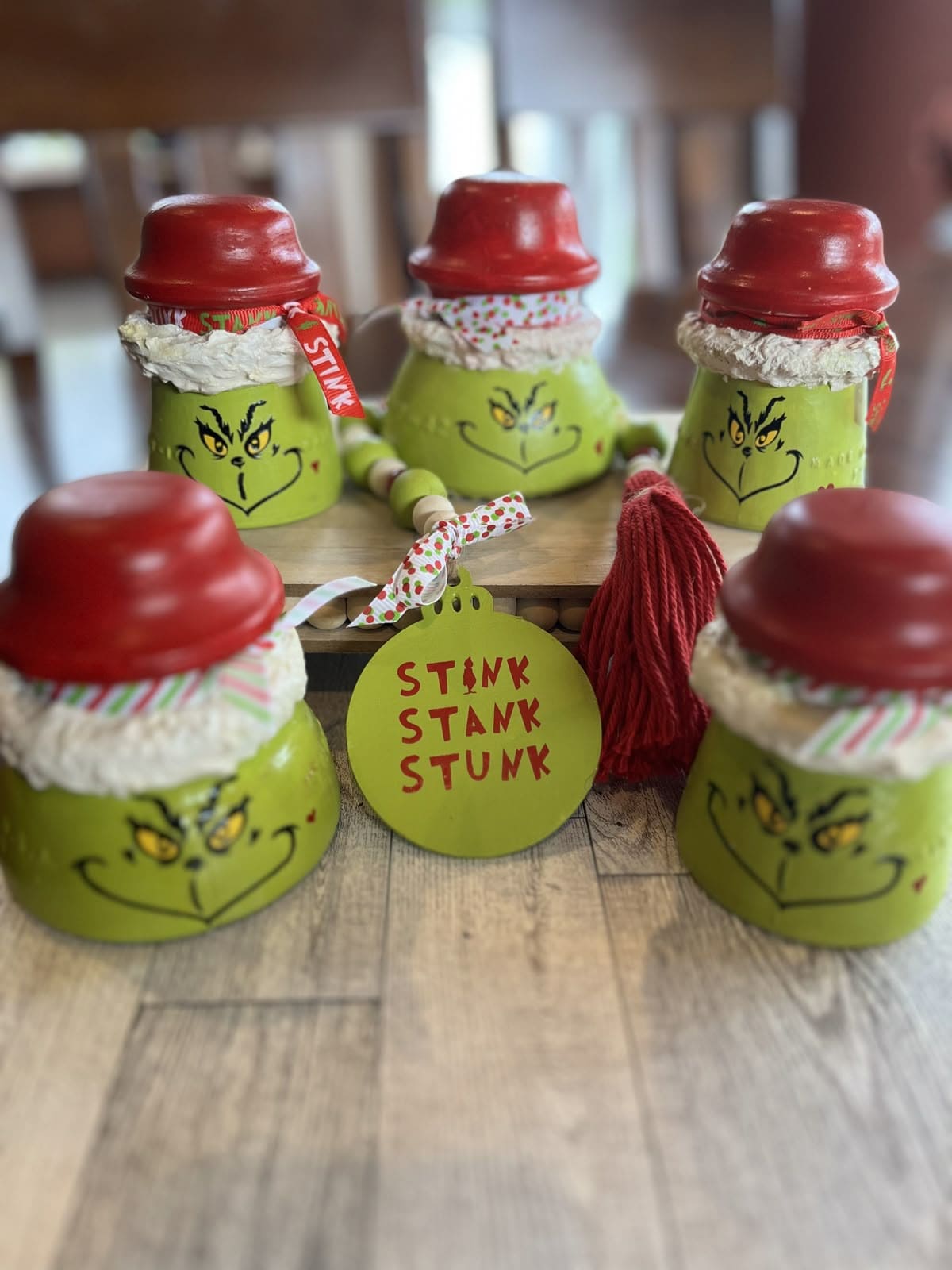 Grinch-Themed Glass Insulator Crafts