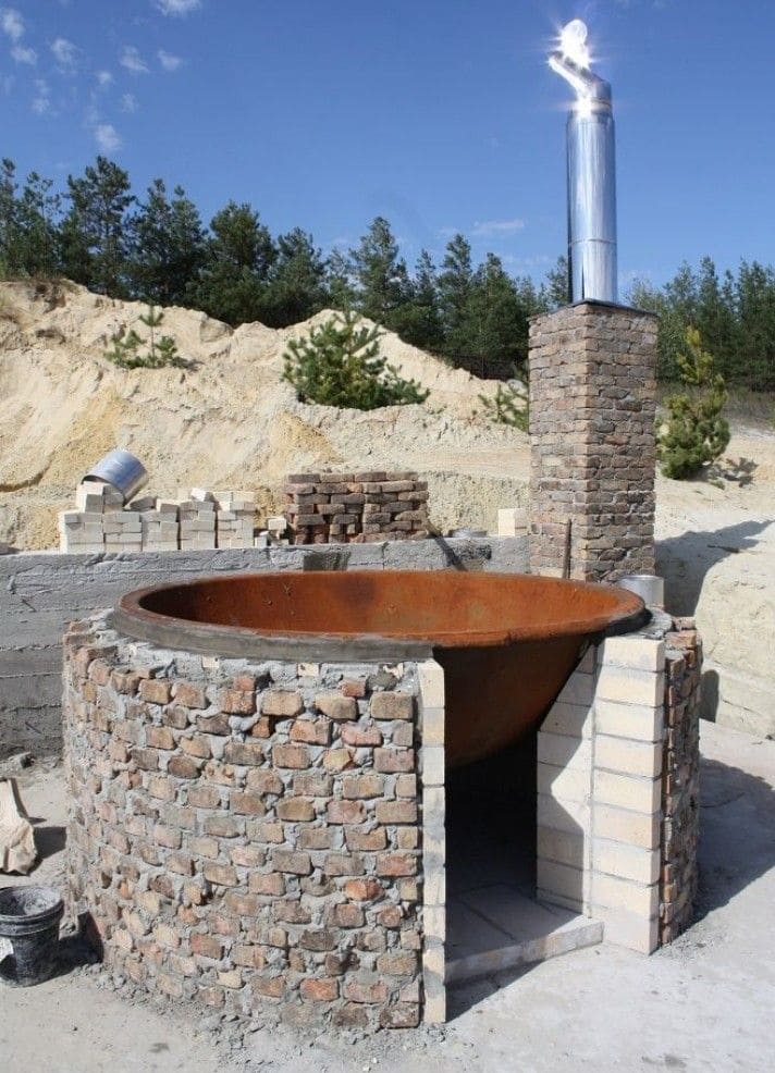 20 Outdoor Hot Tub Setups That Redefine Home Relaxation Industrial Fire Pit Hot Tub