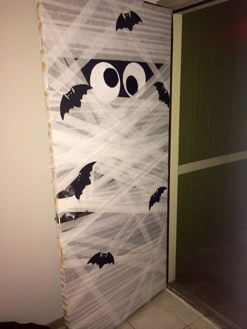 How to Turn Your Front Door Into a Spooky Mummy