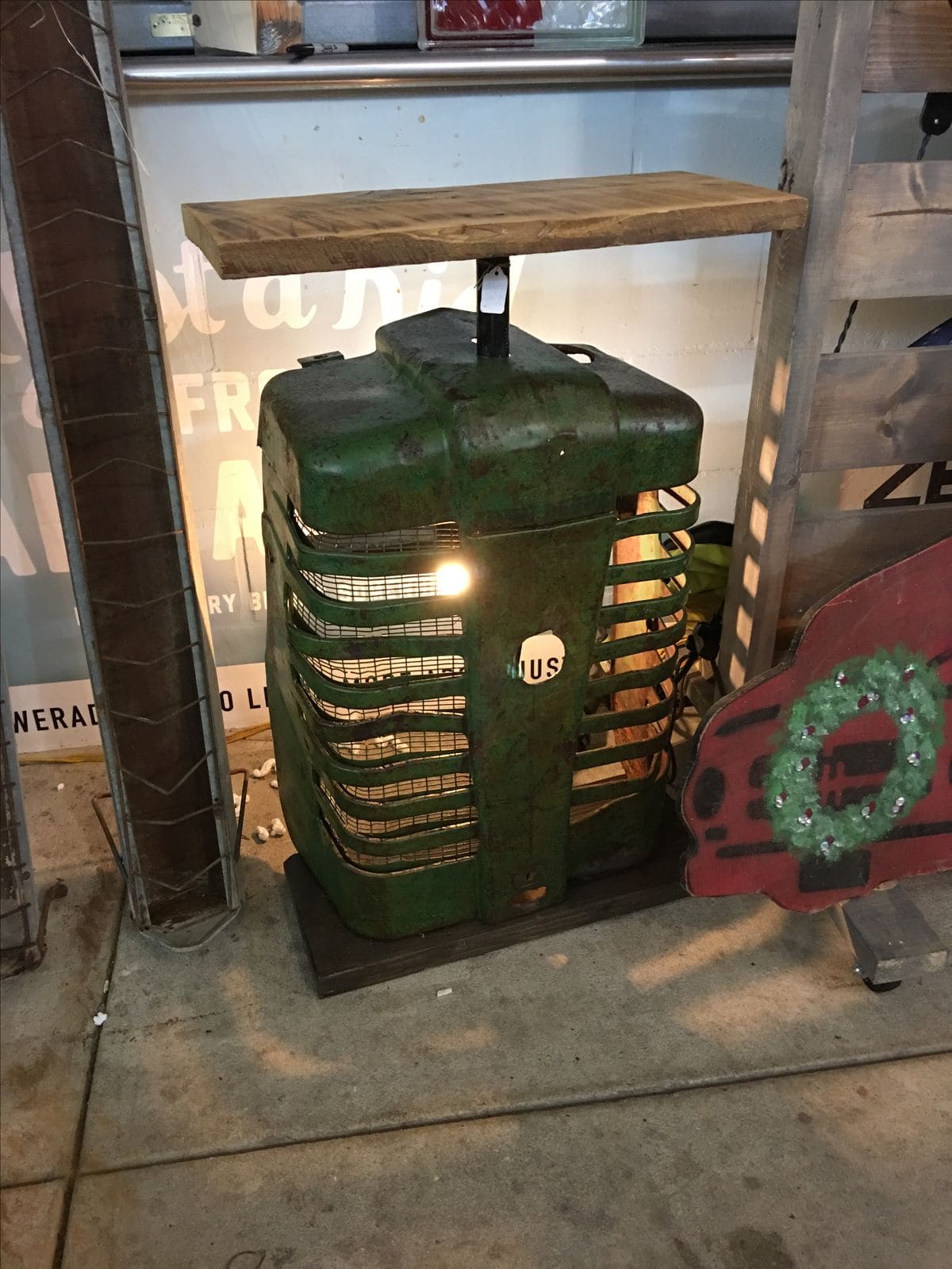 10 Creative Ways to Upcycle Old Tractors for Your Home Rustic Tractor Grill Side Table