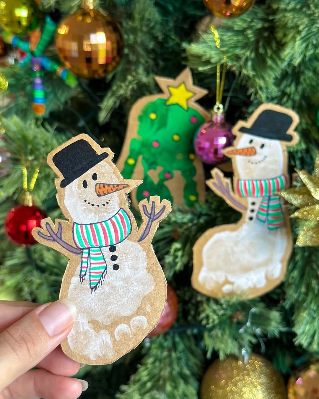 20 Fun Christmas Footprint Crafts to Make with Little Feet Snowy Footprint Snowman Ornaments