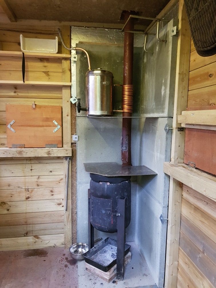 How to Build an Off-Grid Copper Coil Water Heater for Endless Hot Water How to Build an Off-Grid Copper Coil Water Heater for Endless Hot Water
