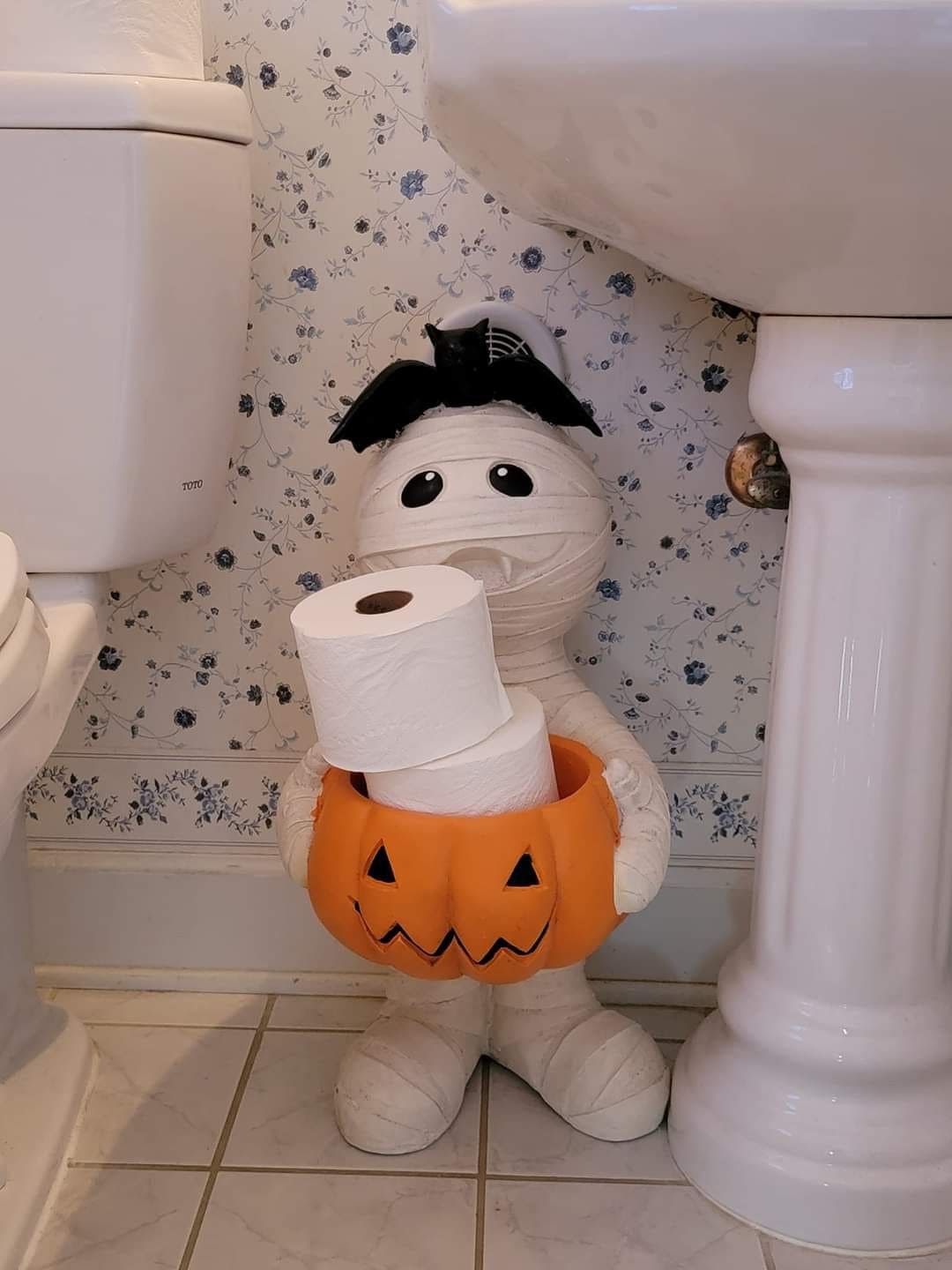 A Spooky-Cute Mummy That Guards Your Bathroom Essentials