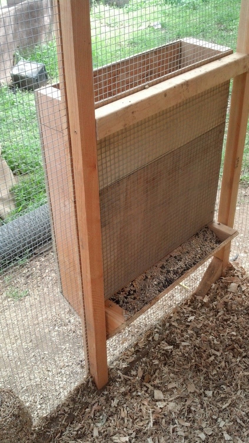 20 Budget-Friendly DIY Chicken Feeders That Reduce Waste Vertical Gravity Wall Chicken Feeder