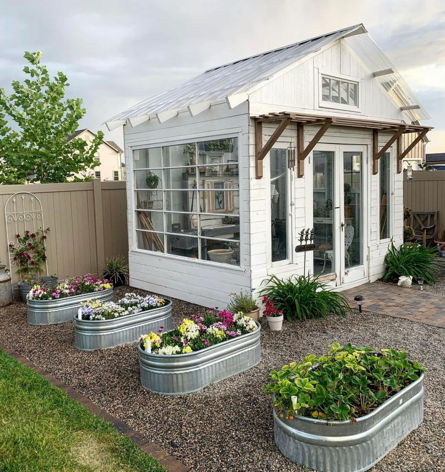 25 Stunning Garden Shed Ideas to Elevate Your Backyard Space Bright and Inviting White Garden Shed