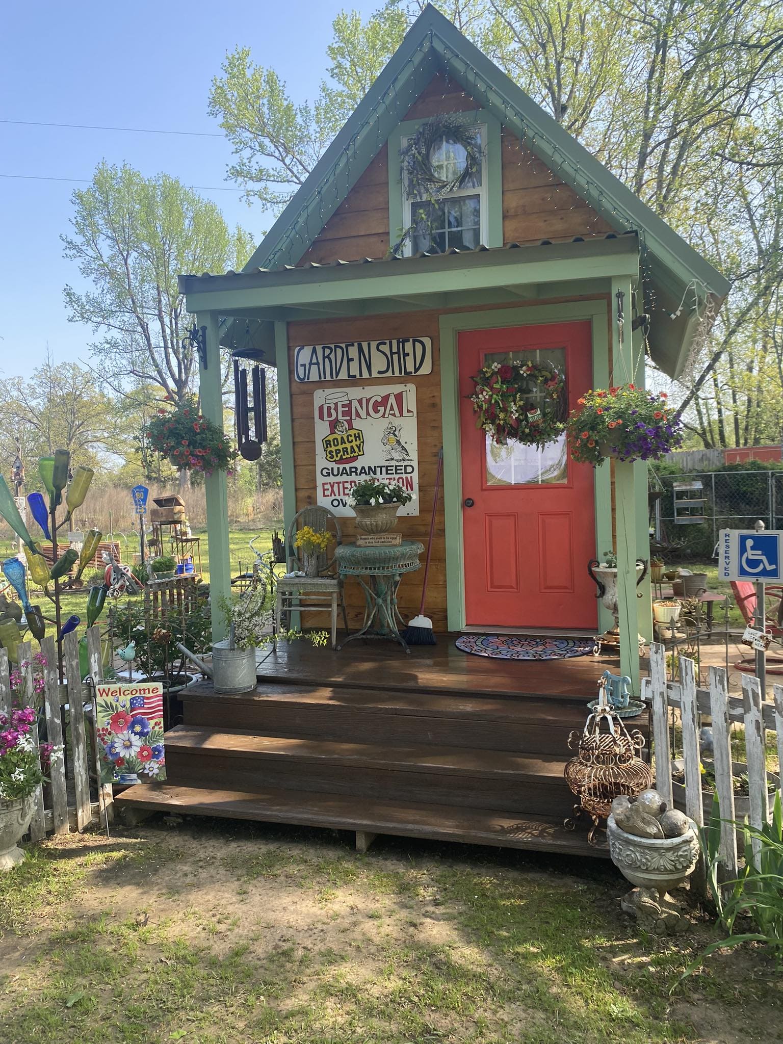 25 Stunning Garden Shed Ideas to Elevate Your Backyard Space Charming Cottage-Style Garden Shed