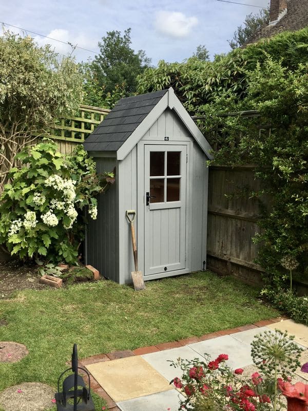 25 Stunning Garden Shed Ideas to Elevate Your Backyard Space Classic Garden Shed in Gray