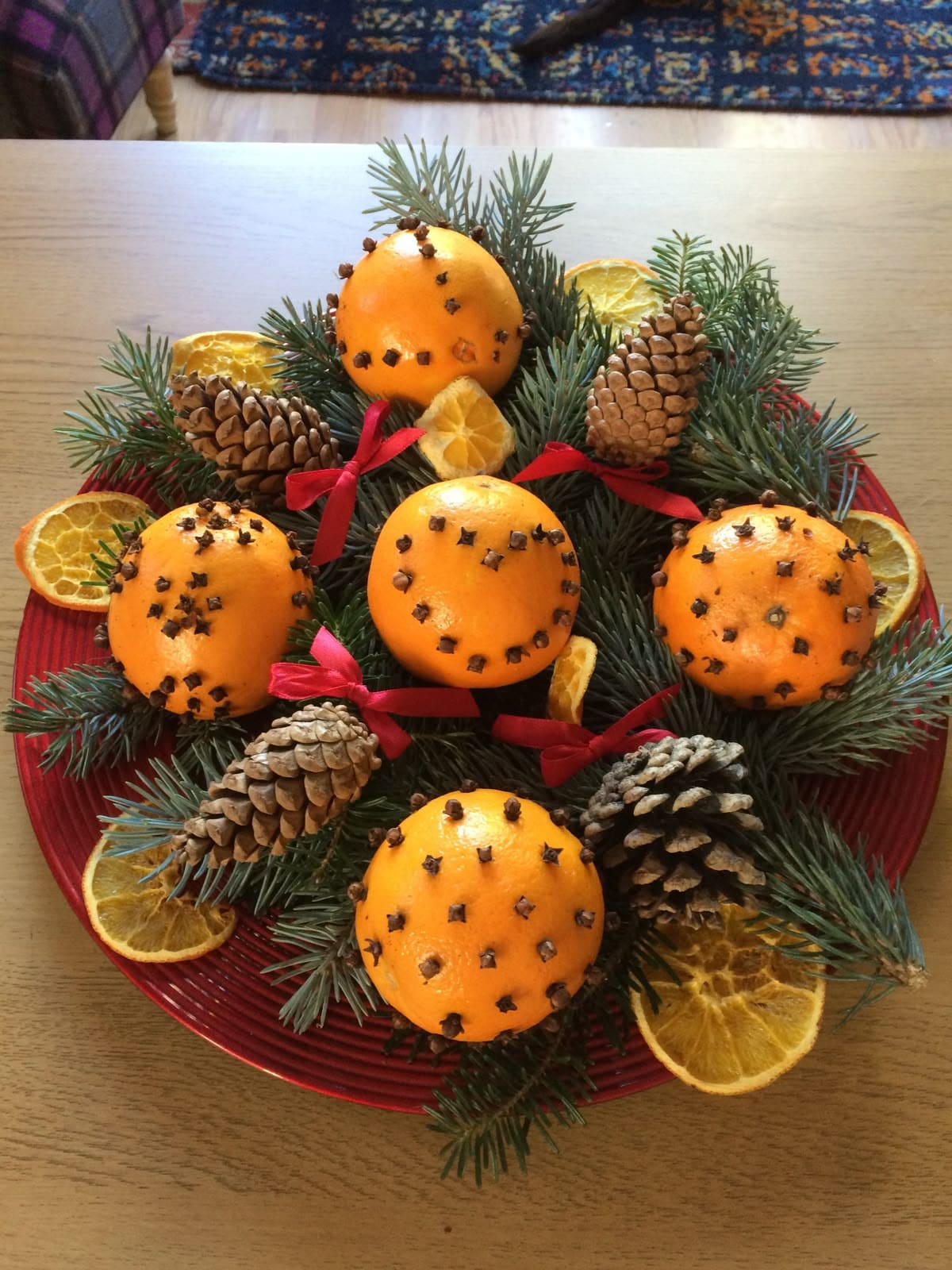 10 Ways to Fill Your Home with Christmas Spice Scents Clove-Studded Oranges