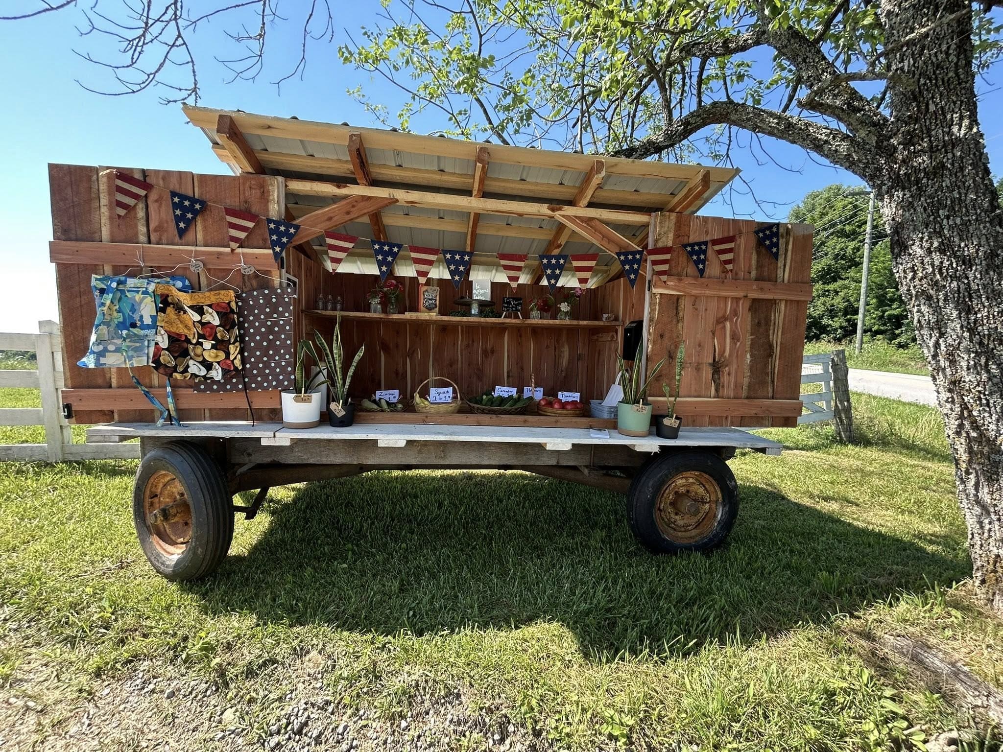 22 Charming DIY Farm Stand Ideas to Inspire Your Homestead Patriotic Wagon Farm Stand Display